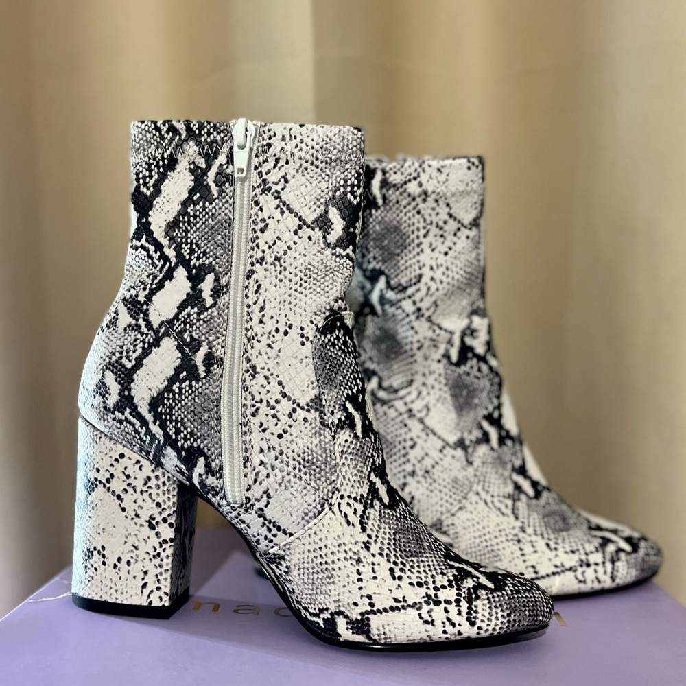 Faux. Brand new. Size 6.5